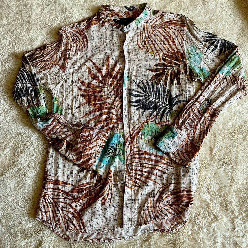 Casual button down patterned shirt.